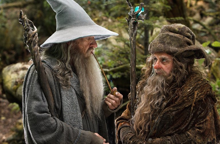 THE HOBBIT: AN UNEXPECTED JOURNEY, from left: Ian McKellen, Sylvester McCoy, 2012. ph: Mark Pokorny/©Warner Bros. Pictures/Courtesy Everett Collection
